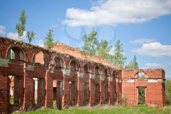 Abandoned landmark: walls of military quarters. Was built in 6 years from 1818. Architect - Vasily Petrovich Stasov. Selishi village, Novgorod region, Russia