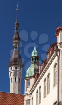 Old Tallinn street fragment with tall town hall tower