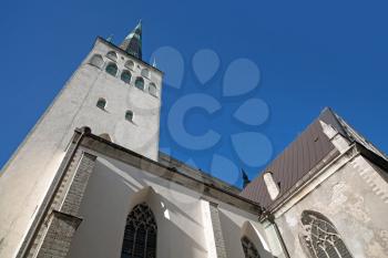 Church of St. Olaf above deep blue sky in old Town of Tallinn, Estonia
