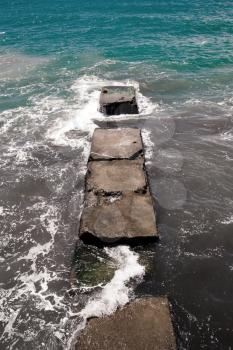 i shaped concrete pier on Black Sea coast.