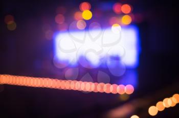 Blurred photo background, life music concert hall with colorful illumination, bokeh effect
