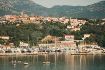 Corsica island, France. Summer coastal landscape of Porto-Vecchio town. Retro tonal correction filter