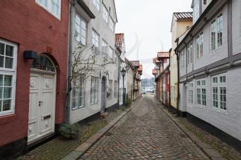 Narrow street perspective, old town of Flensburg, Germany