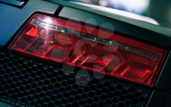 Full LED rear lights on a luxury sports car, close up photo 