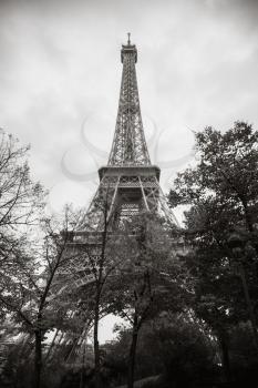 Eiffel Tower, the most popular landmark of Paris, France. Monochrome sepia toned photo