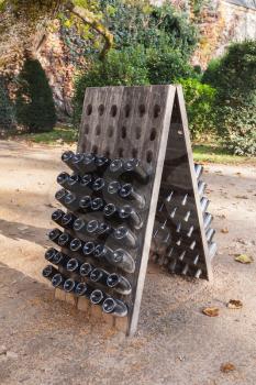 Wooden stand for empty wine bottles, France