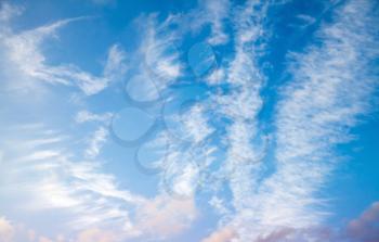 Cirrus clouds formation in deep blue sky, natural photo background