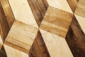 Wooden parquet flooring design with volume cubes pattern. Background photo