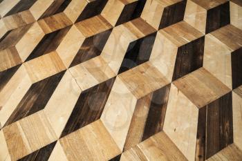 Vintage wooden parquet flooring design with volume cubes illusion. Background photo