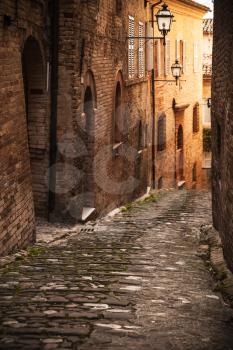 Vertical street view, Fermo, old town. Italy