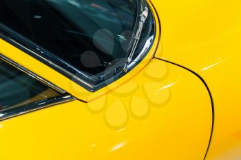 Body parts of luxury vintage yellow roadster, Italian car design