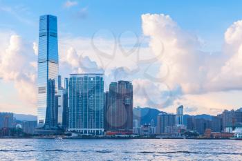 Modern cityscape with skyscrapers. International Commerce Centre of Hong Kong under cloudy evening sky