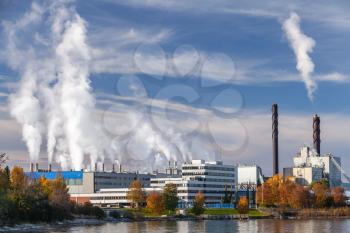 Industrial landscape with thermomechanical pulp mill factory in Skogn, Norway
