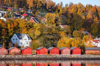 Stenkjer, Trondheim region. Norwegian coastal landscape with colorful wooden houses and red barns