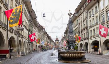 Street view of Kramgasse or Grocers Alley. It is one of the principal streets in the Old City of Bern, Switzerland