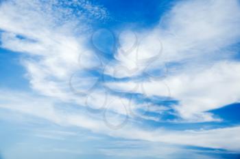 Cirrus clouds in blue sky at daytime. Background photo texture
