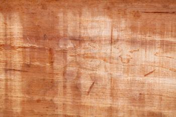 Old grungy plywood with red mordant, background photo texture