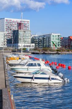 Stockholm. Vertical cityscape with pleasure boats moored in Sodermalm district