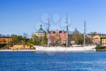 Vintage white sailing ship moored near Skeppsholmen, one of the islands of Stockholm