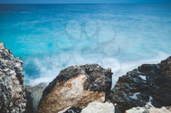 Rocky coast of Mediterranean Sea. Long exposure photo with natural blurred water effect. Landscape of Ayia Napa, Cyprus island