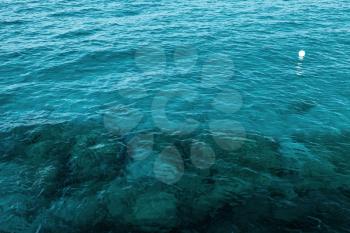 Deep blue water of Mediterranean Sea, background photo taken from coast of Cyprus island in summer