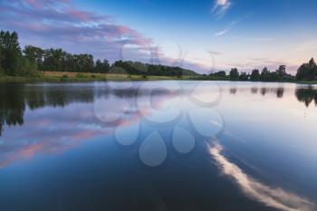 Still lake dramatic landscape in summer evening, natural background photo
