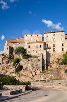 Stone houses on the rock. Old Corsican town landscape, Sartene, South Corsica, France. Vertical street view