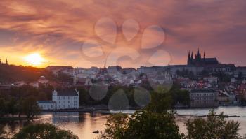 Czech Republic, Old Prague town at sunset. Cityscape with St. Vitus Cathedral on horizon