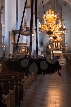 Trinitatis Church interior with Christmas decoration and candles. The Church is located in central Copenhagen, Denmark. It is part of the 17th century Trinitatis Complex