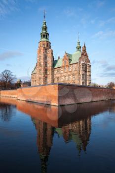 Exterior of Rosenborg Castle, renaissance castle located in Copenhagen, Denmark. Vertical photo