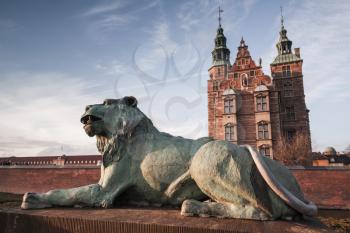 Bronze Lion statue near the entrance to Rosenborg Castle, renaissance castle. Copenhagen, Denmark