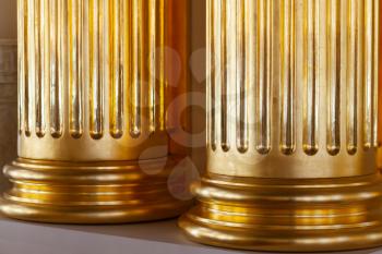 Luxury classic style architecture template, bases of round gold colored columns