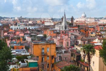 Cityscape of old Rome, Italy. Spire of All Saints Church as a dominants landmark