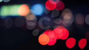 Blurred lights, bokeh effect. Abstract background photo