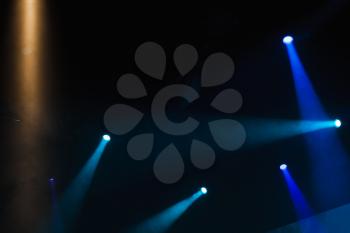 Blue spot lights, stage illumination background photo