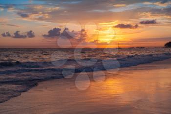 Colorful sunrise over Atlantic Ocean. Bavaro beach, Hispaniola Island. Dominican Republic, coastal morning landscape