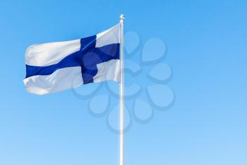 Flag of Finland or Blue Cross Flag over blue sky background