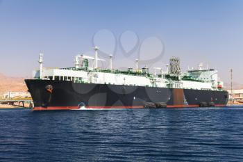 Loading of huge oil tanker in new port of Aqaba, Jordan
