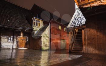 Bergen Bryggen street view at night. Traditional Norwegian wooden houses