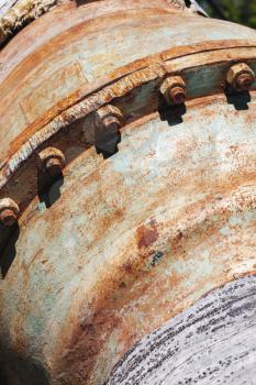 Abstract industrial pipeline fragment, rusty flange