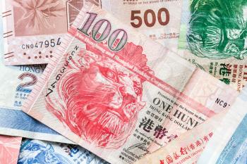 Hong Kong dollars, colorful banknotes close-up, background photo