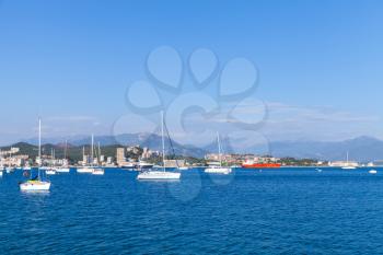 Sailing yachts and motor boats moored in bay of Ajaccio, Corsica island, France