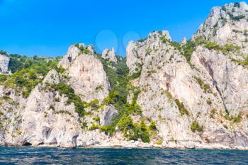 Coastal landscape, rocks of Capri island, Mediterranean Sea coast, Italy