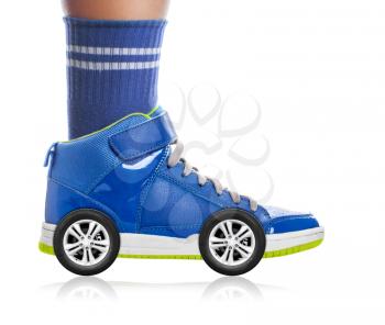 Blue Sport shoe with wheels isolated on white, speed concept