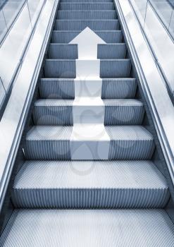 Shining metal escalator with white arrow moving up, perspective effect, Blue toned 3d illustration combined with photo background