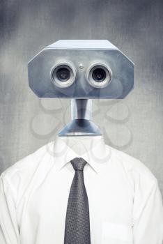 Closeup frontal portrait of vintage robot android in white shirt with classical tie over gray background