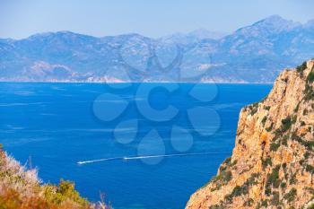 Coastal landscape of Corsica with rocks and sea. Gulf of Porto, view from Capo Rosso, Piana region