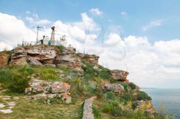 Touristic viewpoint with ordinary tourists on the tip of Kaliakra headland, Bulgaria