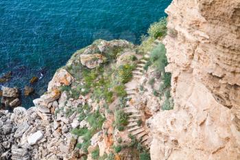 Coastal cliff with stone stairway. Bulgaria, Black Sea Coast, Kaliakra headland