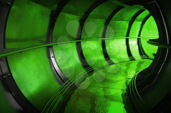 Abstract green underground industrial sewerage tunnel interior 